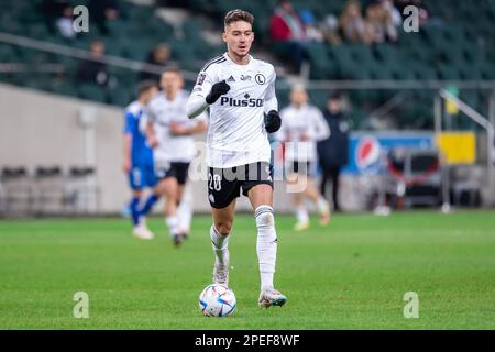 Varsovie, Pologne. 12th mars 2023. Ernest Muci de Legia en action pendant le match polonais PKO Ekstraklasa League entre Legia Warszawa et PGE FKS Stal Mielec au Maréchal Jozef Pilsudski Legia Warsaw Municipal Stadium. Score final; Legia Warszawa 2:0 PGE FKS Stal Mielec. Crédit : SOPA Images Limited/Alamy Live News Banque D'Images