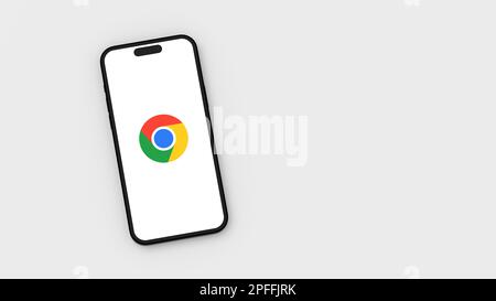 Logo Google Chrome sur l'écran du téléphone portable sur fond gris avec espace de copie Banque D'Images