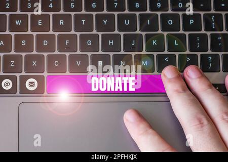 Texte d'écriture faire un don. Mot pour donner de l'argent ou des biens pour bonne cause par exemple à la charité ou aux personnes Banque D'Images