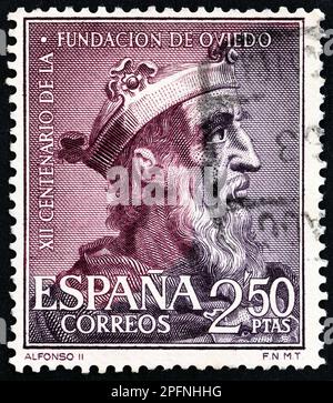 ESPAGNE - VERS 1961: Un timbre imprimé en Espagne pour le 1200th anniversaire d'Oviedo montre Alfonso II, roi des Asturies, vers 1961. Banque D'Images