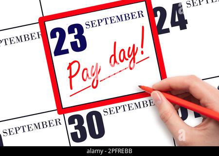 23rd jour de septembre. Écrivez à la main le texte DE LA DATE DE PAIEMENT sur la date du calendrier 23 septembre et soulignez-le. Date d'échéance du paiement. Notion de paiement de rappel. AUT Banque D'Images