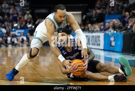 Sacramento, Californie, États-Unis. 18th mars 2023. Les Bruins de l'UCLA gardent Jaylen Clark (0) et les Wildcats du Nord-Ouest gardent Julian Roper II (5) pour combattre le ballon lors d'un match du tournoi de la NCAA au Golden 1 Centre à Sacramento, samedi, 18 mars 2023. Princeton Tigers bat les Tigers du Missouri 78-63. (Credit image: © Paul Kitagaki Jr./ZUMA Press Wire) USAGE ÉDITORIAL SEULEMENT! Non destiné À un usage commercial ! Banque D'Images