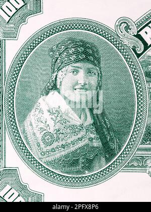 Femme en costume régional de l'argent tchécoslovaque - koruna Banque D'Images