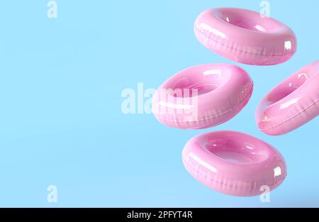 Modèle de bannière cercle gonflable rose avec espace de copie pour le texte. Concept de l'heure d'été. Accessoires de plage isolés sur fond bleu. Papier peint été. Banque D'Images