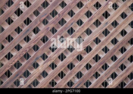 clôture en bois avec panneaux diagonaux comme arrière-plan Banque D'Images