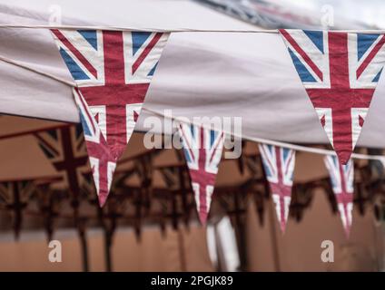 L'Union britannique colorée est à l'origine de drapeaux à la tête d'un village. Banque D'Images