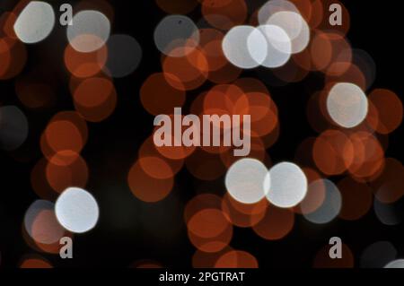 Bokeh Photographie de lumières orange. Feux bokeh orange et blanc. Banque D'Images
