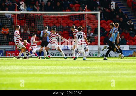 ECO - Power Stadium, Doncaster, Angleterre - 25th mars 2023 but - Mitch Pinnock (à droite) de Northampton Town pousses et le ballon passe par les mains de Jonathan Mitchell Goalkeeper de Doncaster Rovers - pendant le jeu Doncaster Rovers Northampton Town, Sky Bet League Two, 2022/23, ECO - Power Stadium, Doncaster, Angleterre - 25th mars 2023 crédit: Arthur Haigh/WhiteRosePhotos/Alay Live News Banque D'Images