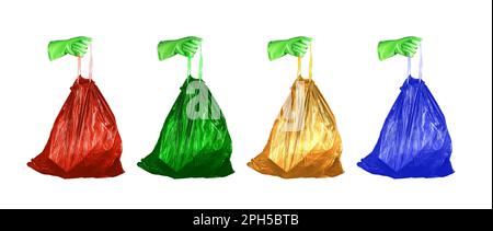 Concept de tri des déchets. Mains tenant des sacs poubelle de différentes couleurs pour différents types de déchets, rouge, vert, jaune et bleu. Banque D'Images