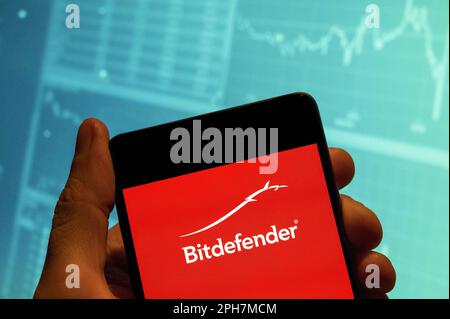 Chine. 15th févr. 2023. Dans cette illustration, le logo de la société roumaine de cybersécurité et d'anti-virus Bitdefender s'affiche sur un smartphone avec un graphique d'indice boursier économique en arrière-plan. (Credit image: © Budrul Chukrut/SOPA Images via ZUMA Press Wire) USAGE ÉDITORIAL SEULEMENT! Non destiné À un usage commercial ! Banque D'Images
