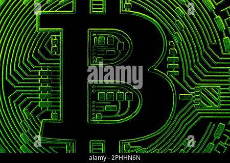 Macro de gros plan avec symbole de pièce de monnaie en Bitcoin avec des couleurs noir et vert; papier peint BTC On circuits Banque D'Images