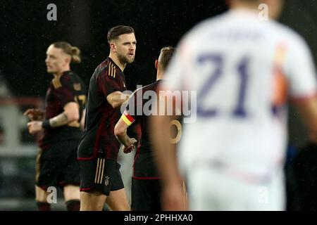 Cologne, Allemagne. 29th mars 2023. Football: International, Allemagne - Belgique, RheinEnergieStadion. Niclas Füllkrug (centre) célèbre après son objectif de faire 1:2. Credit: Rolf Vennenbernd/dpa/Alay Live News Banque D'Images
