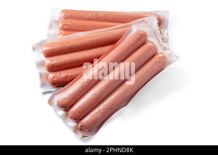 Saucisses wurstel ou saucisses de Vienne en sachet sous vide pour la cuisson sous vide, isolées sur fond gris avec passe-cheveux inclus. Banque D'Images