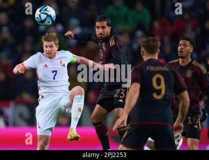 Emre CAN, DFB 23 Felix Nmecha, DFB 16 concourent pour le ballon, s'attaquer, duel, header, zweikampf, Action, lutte contre Kevin DE BRUYNE, Belgique Nr.7 dans le match amical ALLEMAGNE - BELGIQUE 2-3 préparation aux championnats d'Europe 2024 en Allemagne, saison 2022/2023, le 28 mars 2023 à Cologne, Köln, Allemagne. © Peter Schatz / Alamy Live News Banque D'Images