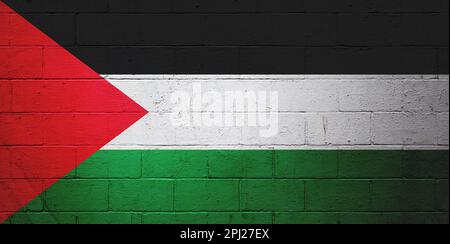 Drapeau de Palestine peint sur un mur de blocs de cinder. Banque D'Images