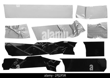 Jeu de bandes adhésives grises et noires sur fond blanc, vue de dessus Banque D'Images