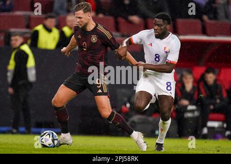 COLOGNE, ALLEMAGNE - MARS 28: Niclas Fullkrug d'Allemagne bataille pour le bal avec Orel Mangala de Belgique pendant le match international amical entre l'Allemagne et la Belgique à RheinEnergieStadion sur 28 mars 2023 à Cologne, Allemagne (photo de Joris Verwijst/ Orange Pictures) Banque D'Images