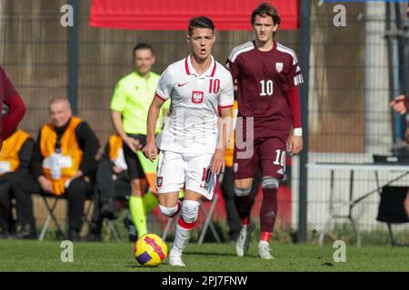 Cracovie, Pologne. 25th mars 2023. Kacper Urbanski, de Pologne, vu en action lors du match rond 2023-Elite du Championnat d'Europe des moins de 19 ans entre la Pologne et la Lettonie au centre d'entraînement de Cracovie. Note finale; Pologne 3:0 Lettonie. (Photo de Grzegorz Wajda/SOPA Images/Sipa USA) crédit: SIPA USA/Alay Live News Banque D'Images