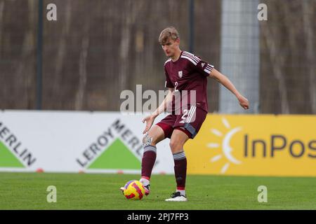 Cracovie, Pologne. 25th mars 2023. Niks Sliede de Lettonie vu en action pendant le championnat européen des moins de 19 ans 2023-Elite round match entre la Pologne et la Lettonie au centre d'entraînement de Cracovie. Note finale; Pologne 3:0 Lettonie. (Photo de Grzegorz Wajda/SOPA Images/Sipa USA) crédit: SIPA USA/Alay Live News Banque D'Images