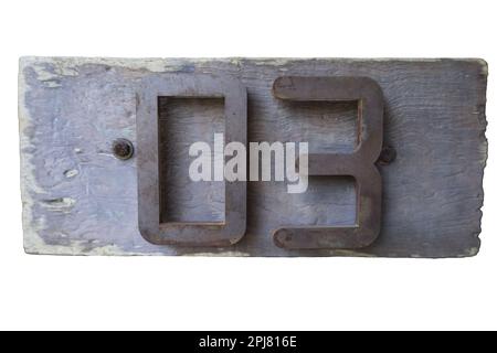 La collection de symboles vieux métal - numéro trois. Isolé sur fond de bois et blanc Banque D'Images