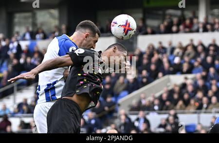 Brighton East Sussex, Royaume-Uni. 1st avril 2023. Lewis Dunk (Brighton) et Ethan Pinnock (Brentford) lors du match de la Premier League Brighton V Brentford au stade Amex de Brighton. Crédit : MARTIN DALTON/Alay Live News Banque D'Images