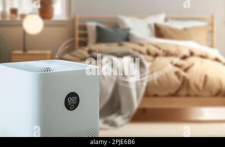 purificateur d'air une chambre, filtre à air éliminant la poussière fine dans la maison. Protection PM 2,5 poussière et pollution de l'air concept Banque D'Images