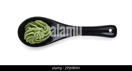 Eutrema wasabi, Wasabi frais root sur metal grater avec racine finement râpé  dans de petits plat de céramique, pâte de wasabi dans petit bol en  céramique avec cuillère Photo Stock - Alamy