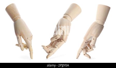 Placez les mains en bois des mannequins sur fond blanc Banque D'Images