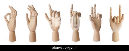 Placez les mains en bois de mannequins montrant différents gestes sur fond blanc. Bannière Banque D'Images