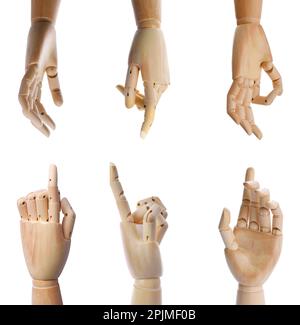 Placez les mains en bois de mannequins montrant différents gestes sur fond blanc Banque D'Images