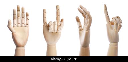 Placez les mains en bois de mannequins montrant différents gestes sur fond blanc. Bannière Banque D'Images