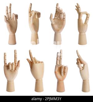Placez les mains en bois de mannequins montrant différents gestes sur fond blanc Banque D'Images
