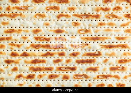 Gros plan du matzo. Pain plat traditionnel juif. Concept de vacances religieuses Pesach. Bonne Pâque. Banque D'Images