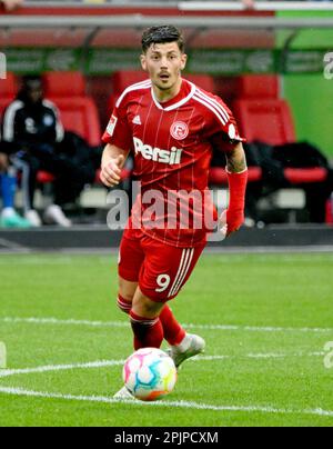 Merkur Spielarena Düsseldorf Allemagne, 31,3.2023, football: 2nd Bundesliga saison 2022/23 match day 26, Fortuna Duesseldorf (F95), rouge vs Hamburger Sportverein (HSV) , bleu — Dawid Kownacki (F95) Banque D'Images