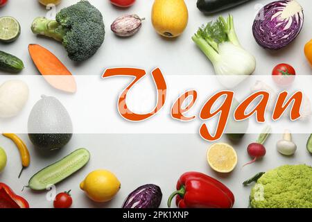 Mot Vegan et légumes frais sur fond blanc, plat Banque D'Images