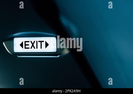 Close up of exit sign dans l'avion. Banque D'Images