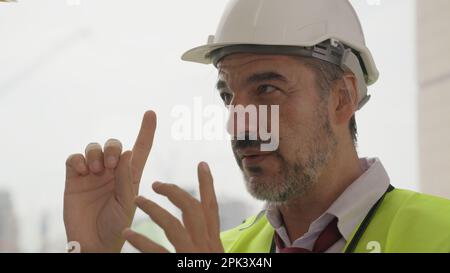 Le contremaître d'ingénieur de construction professionnel discute et remue-méninges Banque D'Images