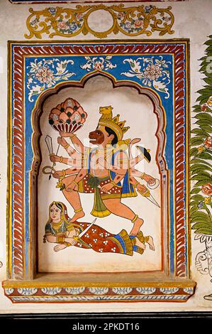 Peinture mythologique colorée sur le mur intérieur du musée Dr. Ramnath Podar Haveli, un musée du patrimoine culturel qui abrite le style de vie Rajasthani, Banque D'Images