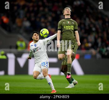 Milan, Italie. 7th avril 2023. L'AC Milan Alexis Saelemaekers (R) vie avec Fabiano Parisi d'Empoli lors d'un match de football entre AC Milan et Empoli à Milan, Italie, sur 7 avril 2023. Credit: Daniele Mascolo/Xinhua/Alay Live News Banque D'Images