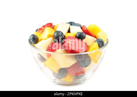 Salade de fruits frais dans le bol isolé sur fond blanc. Vue de dessus Banque D'Images