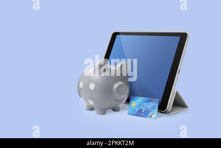 Porggy avec carte de crédit et tablette sur fond de couleur. Services bancaires en ligne Banque D'Images