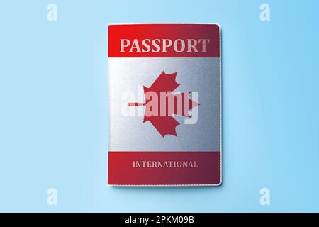 Passeport en cas d'image du drapeau canadien sur fond bleu clair, vue du dessus Banque D'Images