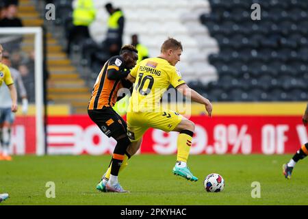 Adama Traore #18 de Hull City et Zian Flemming #10 de Millwall lors du match de championnat Sky Bet Hull City vs Millwall au MKM Stadium, Hull, Royaume-Uni, 10th avril 2023 (photo de Ben Early/News Images) à Hull, Royaume-Uni le 4/10/2023. (Photo par Ben Early/News Images/Sipa USA) Banque D'Images