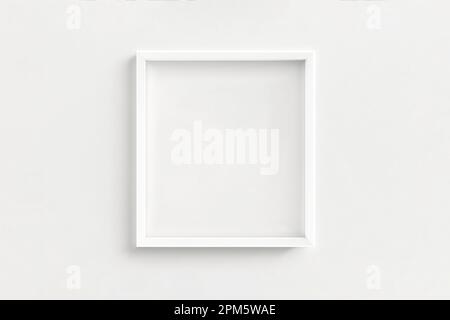 maquette de cadre blanche sur mur blanc. Minimalisme Banque D'Images