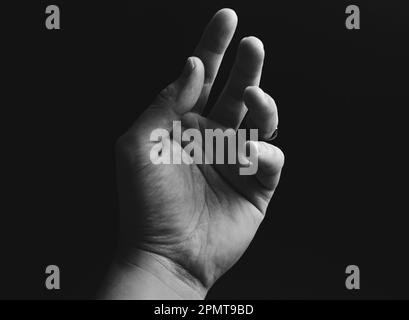Adulte gestes de main masculine en noir et blanc Banque D'Images