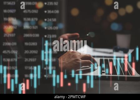 Graphique et indicateur du marché boursier, graphique de chandelier et écran d'ordinateur de négociation d'actions.échange d'investissement financier d'affaires et concept de forex. Banque D'Images