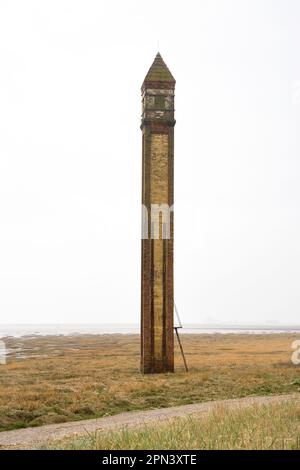 phare de randonnée ou aiguille construit en 1875 sur la côte de cumbria près de barrow in furness Banque D'Images