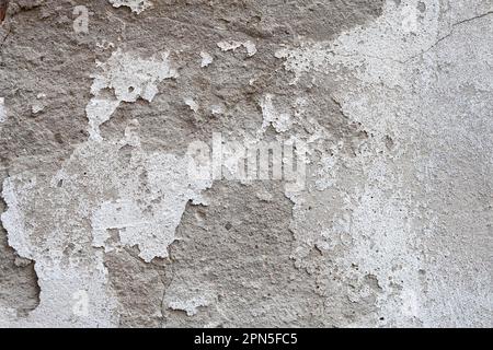 Texture, mur de maison enduit, peinture écaillée Banque D'Images
