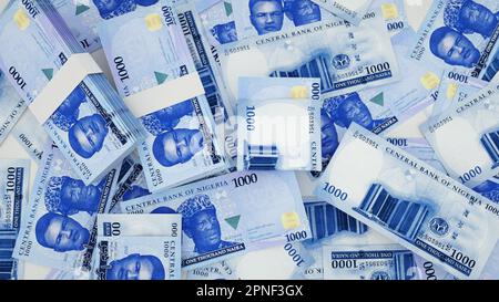 Gros plan des nouvelles notes de naira nigérian 1000 étalées sur la table. 3d rendu de l'argent dispersé à la surface Banque D'Images