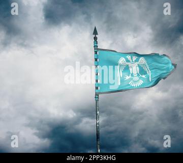 A digital illustration of a flag of the Seljuk Empire waving against a bright yellow sky Stock Photo